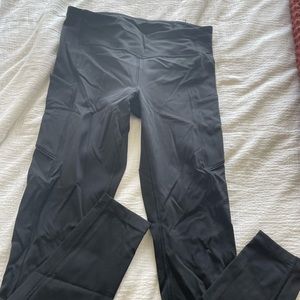 Women’s Lululemon size 6 leggings. Gently worn. Loose stitch on waist pictures.